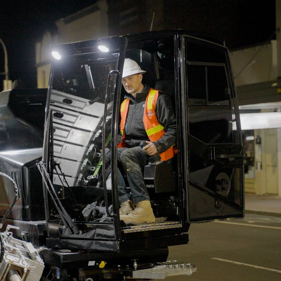 A WB operator at the controls at night.