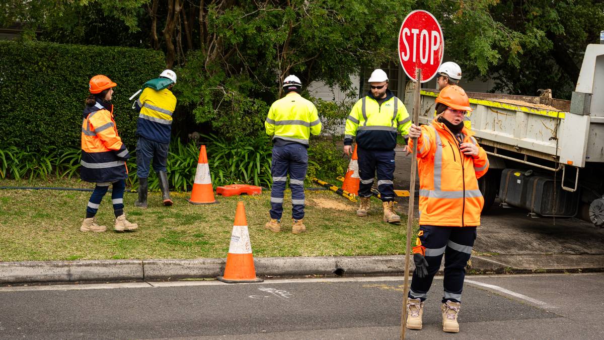 A WB Infrastructure crew on site with traffic control in place.