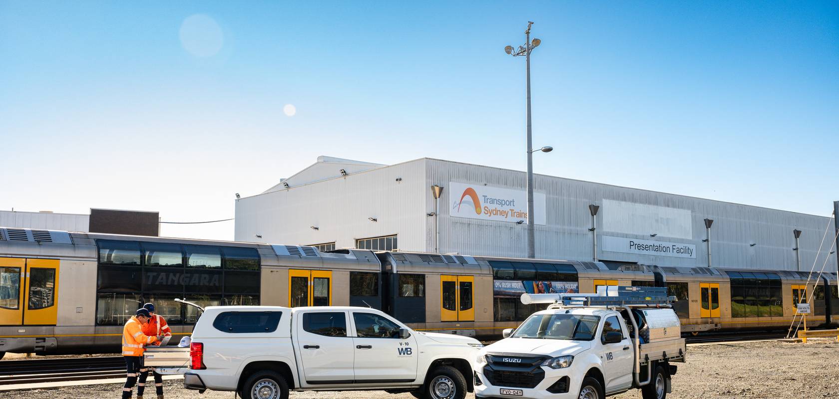 WB service vehicles at an industrial site.